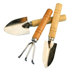 Gardening tools set isolated on white background. Two shovels and a rake for gardening. Herringbone for indoor plants and flowers. Tools with wooden handles. Small shovel. Gardener's tool.