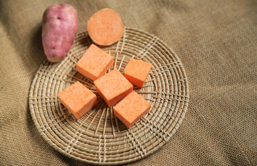 Sweet potato slice cube on sack for being cooking ingredient for make food or dessert