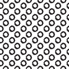 Seamless polka dot pattern with textured rings. Vector background