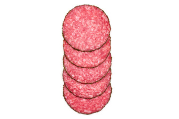 Pepper salami slices, isolated on white background. High resolution image