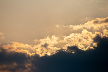 Close-up of beautiful shape rain cloud With the setting sun in the evening