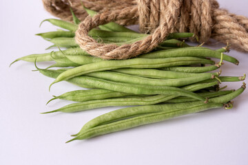 Green beans on the white background.
