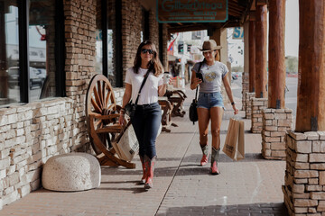 old town Scottsdale Fifth Avenue shops, trying on Native American jewelry in Historic Old Town or...