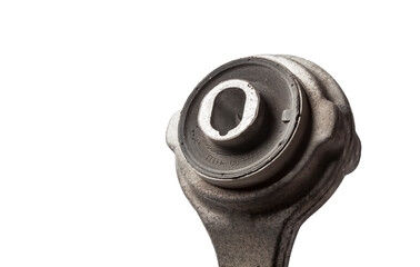 Close-up of a silent block on a used aluminum suspension with fasteners, spare parts for sale during junk yard or for replacement during car service.