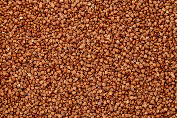 Buckwheat,  dry buckwheat background. Buckwheat texture