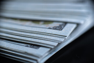 Stack of one hundred American dollars banknotes, close-up.