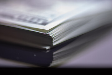 Stack of one hundred American dollars banknotes, close-up.