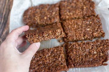 hand taking a flapjack