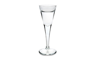 Obraz premium grappa or vodka in a goblet shot glass isolated on white