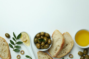 Concept of tasty eating with olive oil on white background