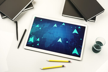 Creative abstract GPS locator sketch with world map on modern digital tablet display, monitoring and tracking concept. Top view. 3D Rendering