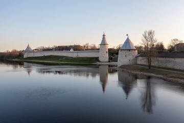 The main attractions of Pskov, a Russian city, a tourist center. Pskov Kremlin, Velikaya river. Sunrise.