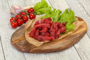 Raw beef meat sliced for cooking