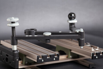 Engraving device pantograph on black background