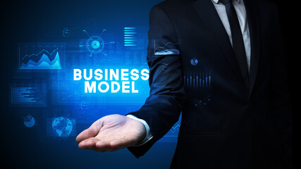 Hand of Businessman holding motivational message