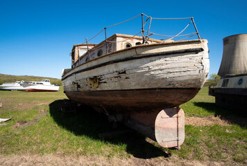 Rudder on an obsolete boat in a salvage yard