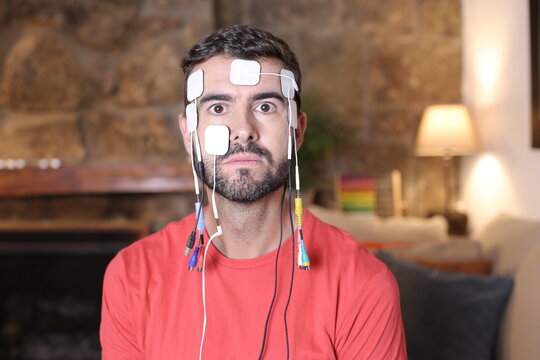 Man with electrodes and digital connections