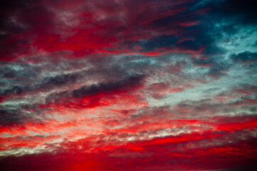 The red clouds of the beautiful summer sunset sky