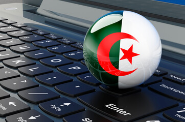 Algerian flag on laptop keyboard. Online business, education, shopping in Algeria concept. 3D rendering