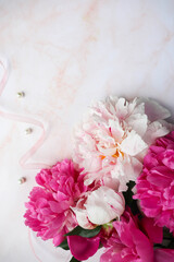 romantic composition. bouquet of pink peonies on a white background 