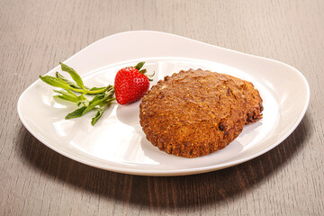 Oats cookies pastry served strawberry
