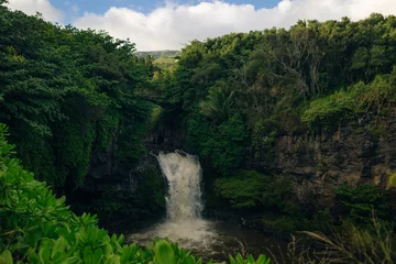 Fototapeten Dramatic series of waterfalls of Ohe'o Gulch cascading in Haleakala National Park, Maui, Hawaii © IBRESTER
