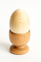 wooden egg in the holder