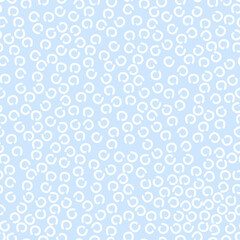 doodle abstract seamless pattern irregular chaotic white circles on contrasting background