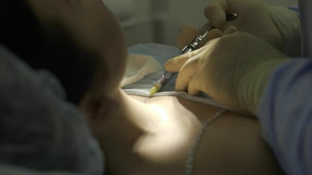 injection of local anesthesia to the patient