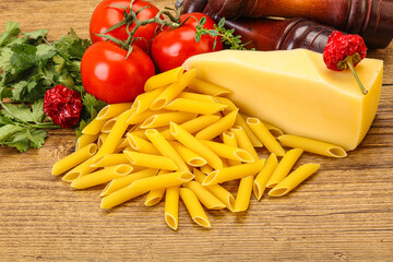 Raw penne rigate for cooking