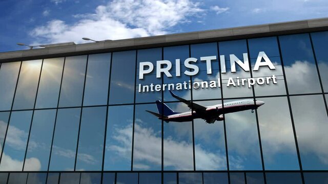 Jet aircraft landing at Pristina, Kosovo 3D rendering animation. Arrival in the city with the glass airport terminal and reflection of the plane. Travel, business, tourism and transport concept.