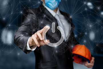 Civil engineer clicks on the power button .