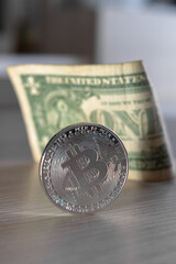 bitcoin coin on a dollar background