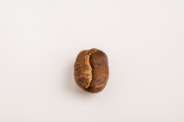 Coffee bean arabica roasted isolated detail on white background