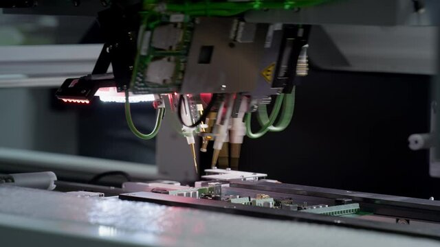 PCB Tiles Manufacturing. Automated Circut Board machine Produces Printed digital electronic board. Automatic assembly of smd components, 4 industrial revolution. Manufacture of electronic chips