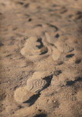 Clear footprints  in the sand