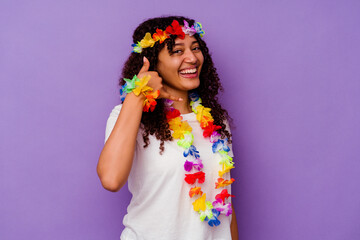 Young Hawaiian woman isolated on purple background showing a mobile phone call gesture with fingers.