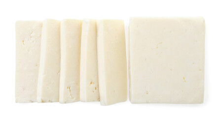 Pieces of feta cheese on a white background, isolated. The view from top