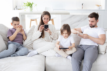 Parents and kids use devices together