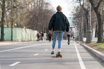 People riding on the skateboard in the public park