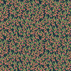 Christmas red berries and green leaves.