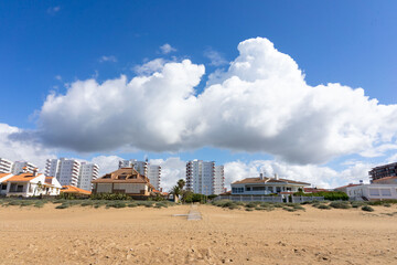 Fototapeta na wymiar panoramic view of the Punta umbria beaach, Huelva on a sunny day with clouds