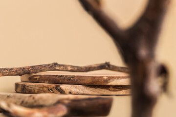 Background for products cosmetics, food or jewellery. Rustic wood pieces podium. Front view.	
