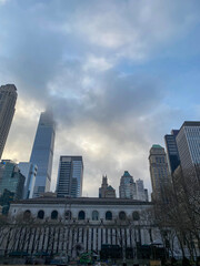 Fototapeta premium Bryant Park Skyline with Clouds and Midtown Towers