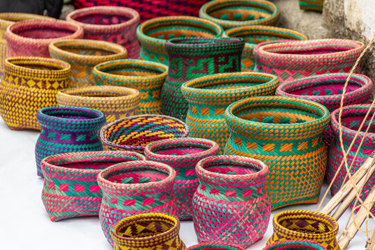Colorful straw baskets are artifacts produced by indigenous cultures and are part of Brazil's national handicrafts.