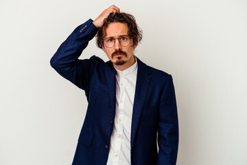 Young business man isolated on white background being shocked, she has remembered important meeting.