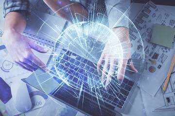 Double exposure of man and woman working together and business theme hologram drawing. Computer background. Top View.