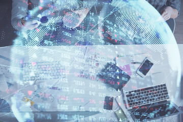 Double exposure of man and woman working together and business theme hologram drawing. Computer background. Top View.