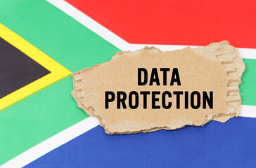 On the flag of South Africa lies a cardboard box with the inscription- DATA PROTECTION