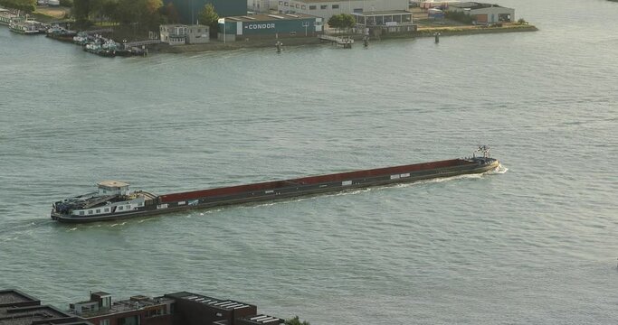 Barge from above on a river